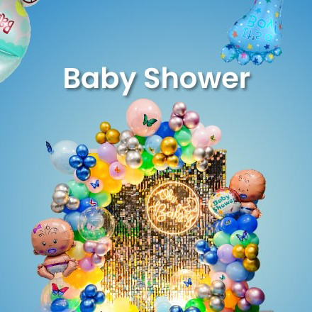 A vibrant and glamorous baby shower decoration featuring a gold shimmer wall, a circular 'Oh Baby' neon sign, and an elaborate, multi-colored balloon garland with butterfly accents.