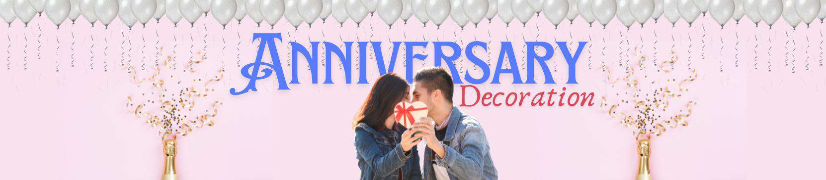 A banner image for "Anniversary Decoration" featuring a romantic couple sharing a moment, holding a heart-shaped gift between them. The background is a soft pink, adorned with silver balloons, golden confetti, and two champagne bottles at the bottom corners.